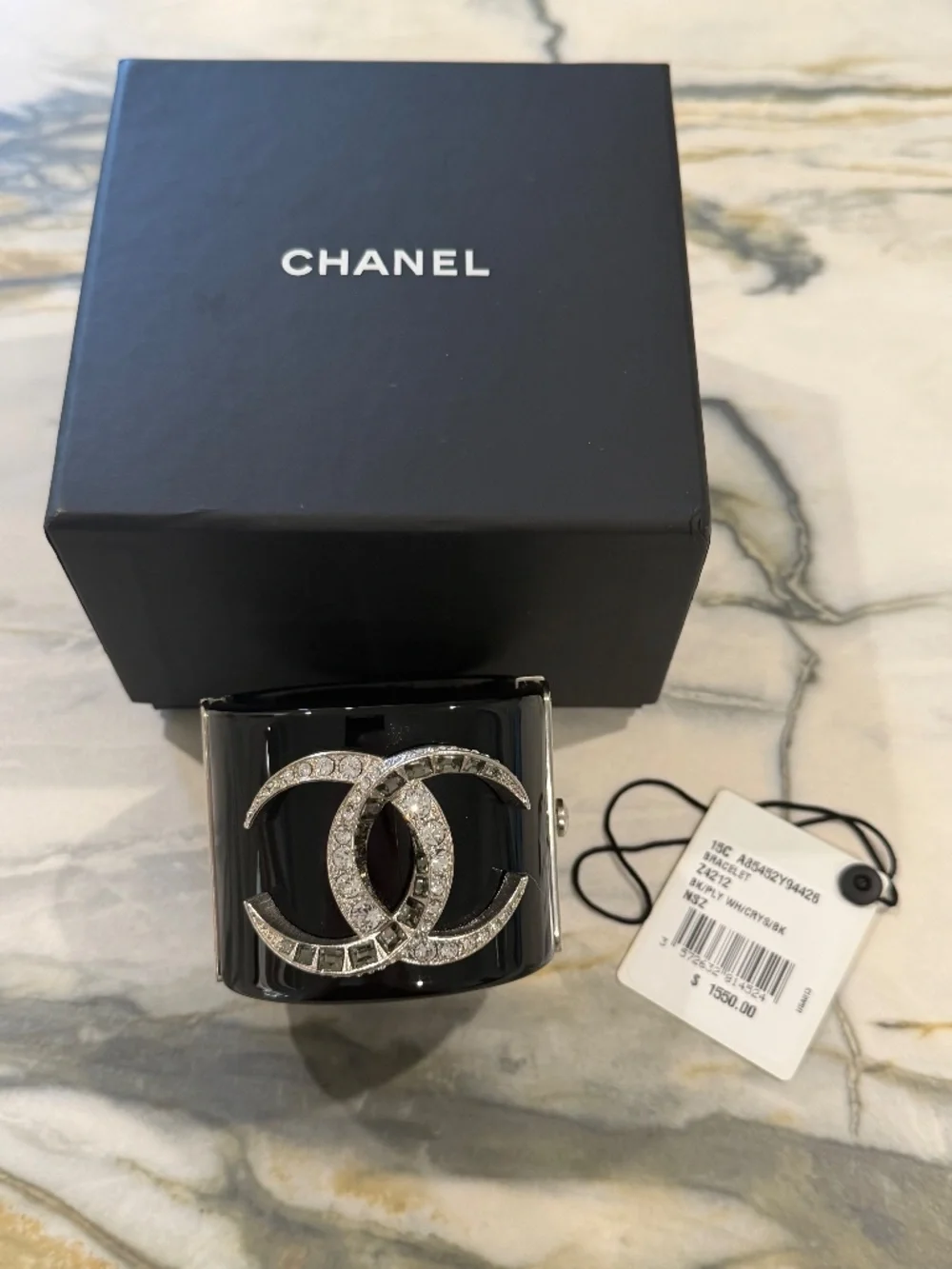 Chanel Black Resin wide cuff bracelet with interlocking CC crystal logo
